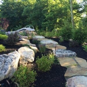 stone slab walkway, boulder, landscaping