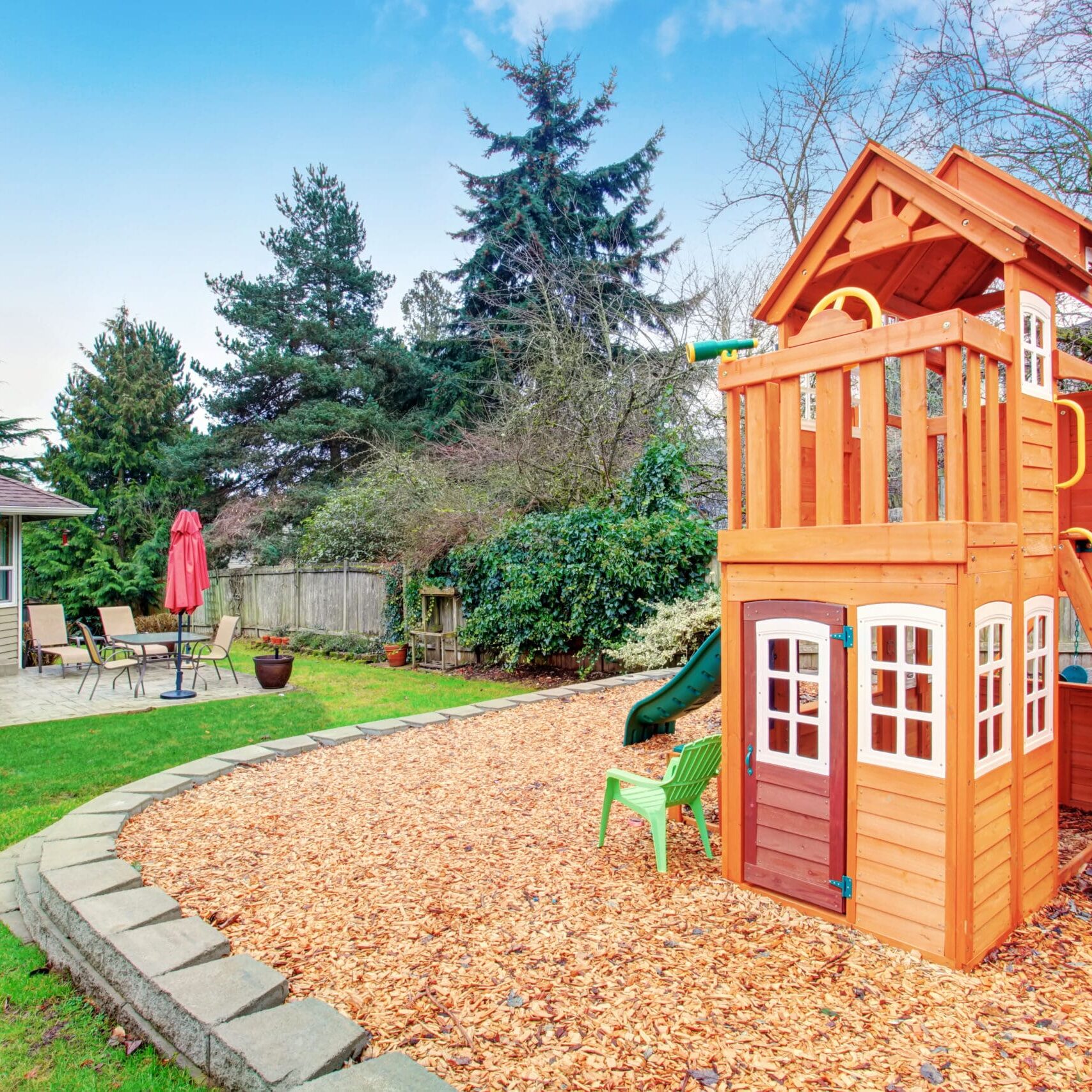 Fenced,Backyard,With,Wooden,Playground,For,Kids